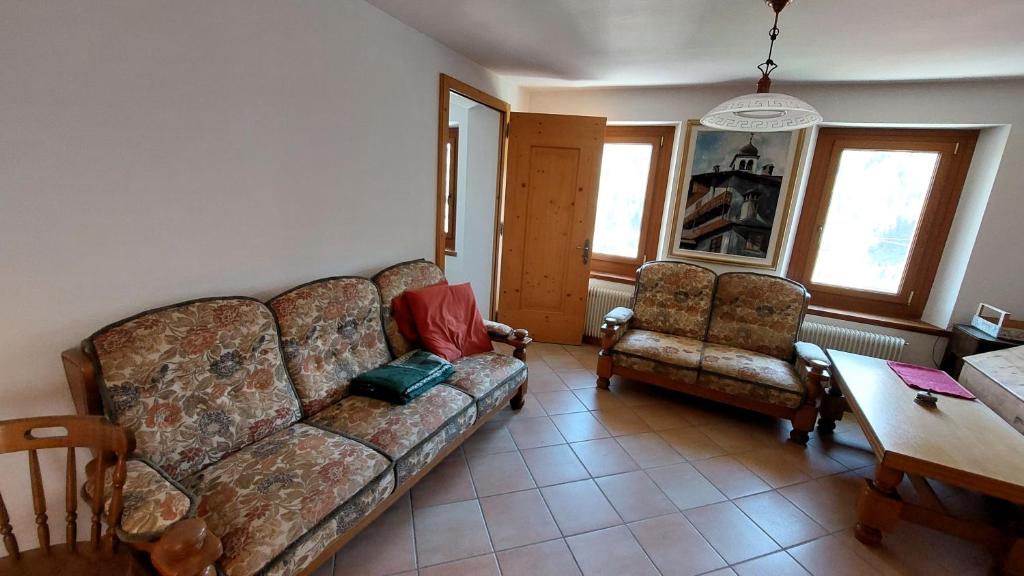Posezení v ubytování Quadrilocale a Zoldo Alto