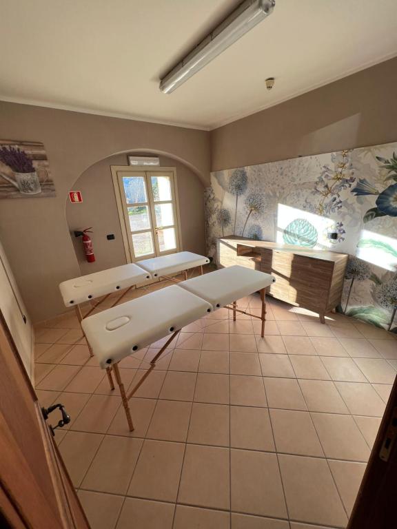Postel nebo postele na pokoji v ubytování Il Castello di Bubbio