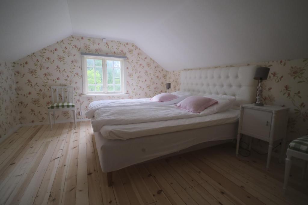 Posteľ alebo postele v izbe v ubytovaní Kristbergs Rusthåll