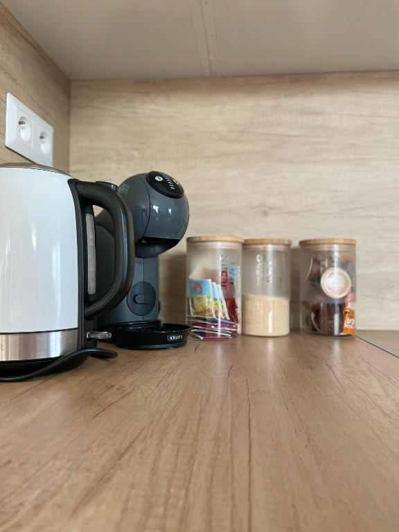 Kuchyň nebo kuchyňský kout v ubytování Klimatizovaný Apartmánový dom, s vírivkou, 1B