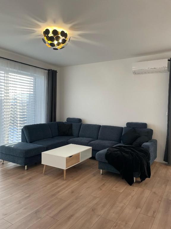 Posezení v ubytování Klimatizovaný Apartmánový dom, s vírivkou, 1B