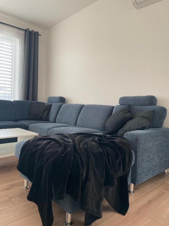 Posezení v ubytování Klimatizovaný Apartmánový dom, s vírivkou, 1B