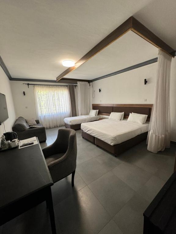 Ліжко або ліжка в номері Ivory Residences