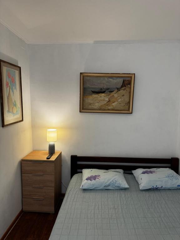 Postel nebo postele na pokoji v ubytování ArtOtrada Mini-hotel