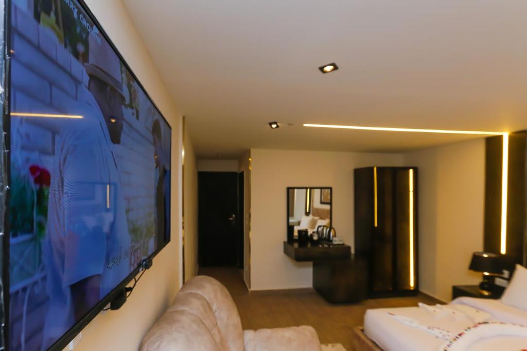 Televiisor ja/või meelelahutuskeskus majutusasutuses Crowne Pyramids View inn