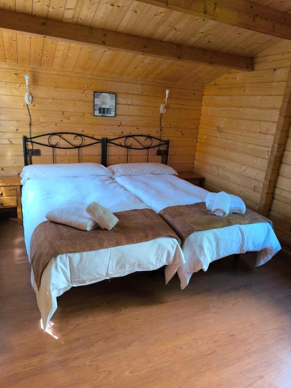 Postel nebo postele na pokoji v ubytování Cabañas Miraduero