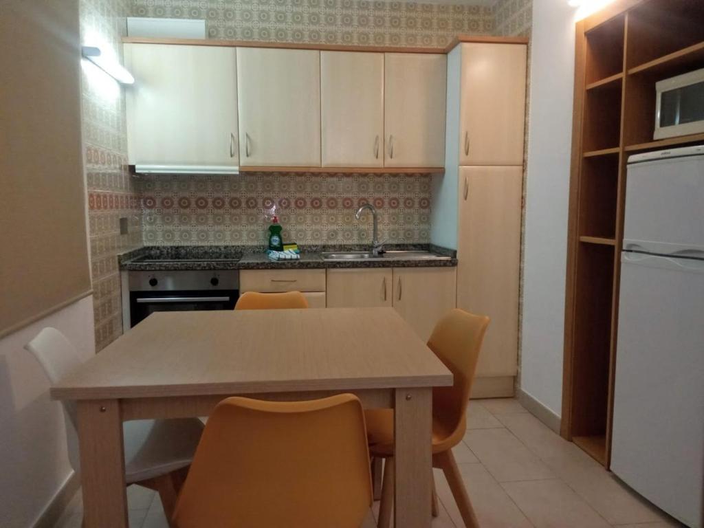 Kuchyň nebo kuchyňský kout v ubytování Apartamentos Orvay
