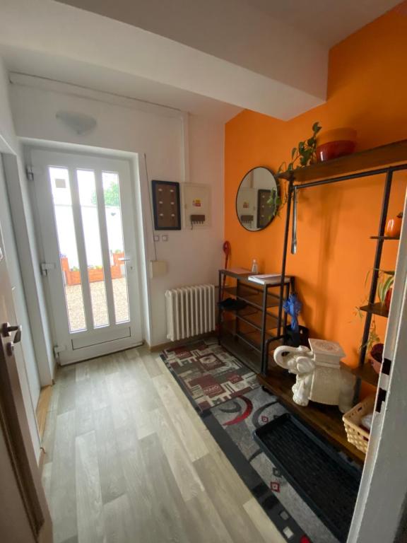a room with a hallway with a door and a mirror at Homestay U Hanky in Zdiby