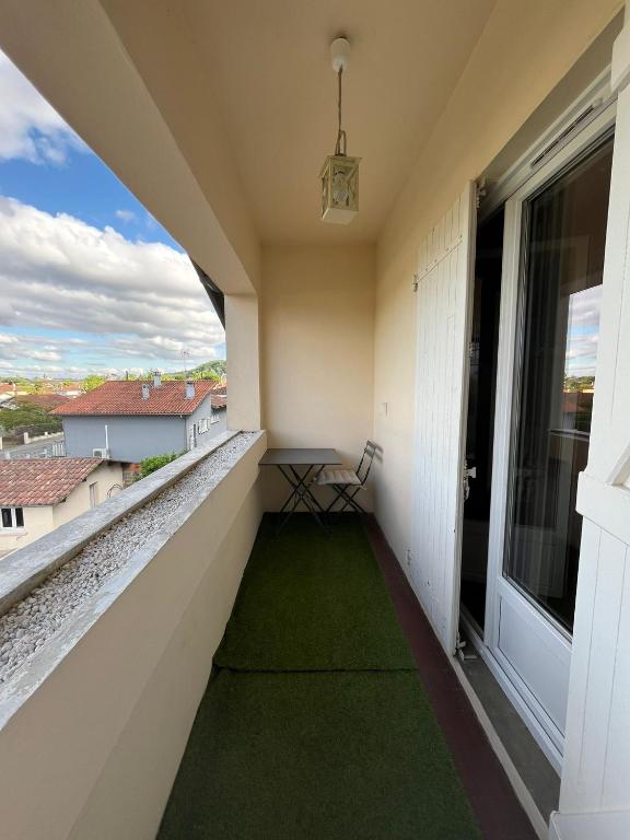 Balkón nebo terasa v ubytování AU PETIT CHENE