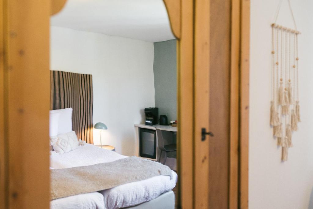 Postel nebo postele na pokoji v ubytování Casa Sisu