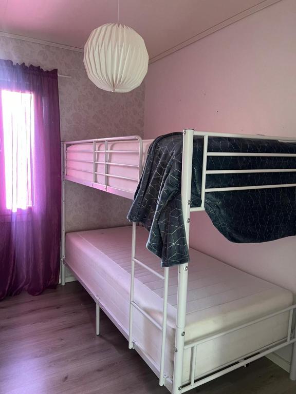 Postel nebo postele na pokoji v ubytování Lägenheter i Luleå