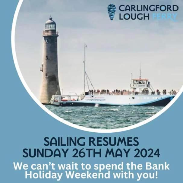 a poster for a charity event with a lighthouse at Carlingford Glamping Hut in Rathcor Lower