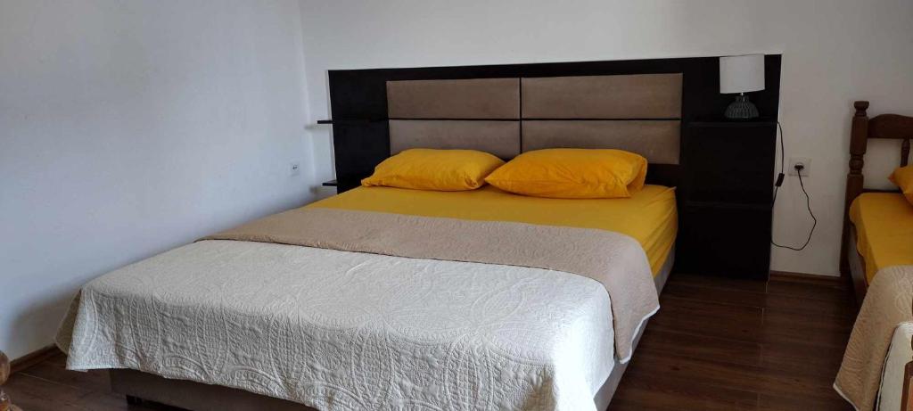 Postel nebo postele na pokoji v ubytování Vila Arb
