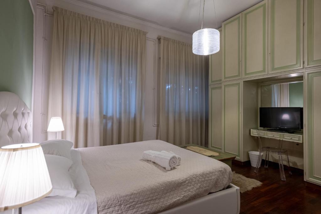 Кровать или кровати в номере Room & Breakfast D'Annunzio