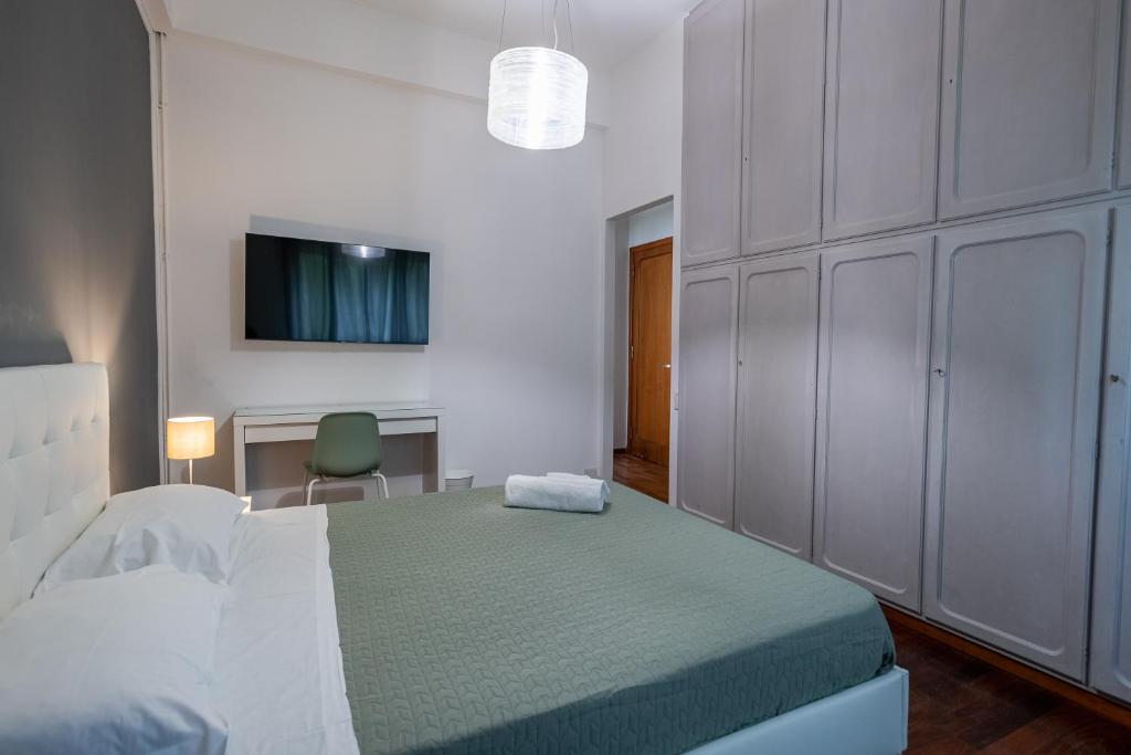 Кровать или кровати в номере Room & Breakfast D'Annunzio