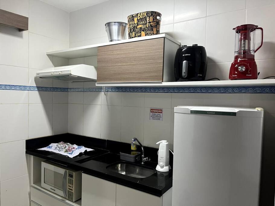 Kuchyň nebo kuchyňský kout v ubytování Flat 625 - Diferenciado com Ar no quarto e na sala