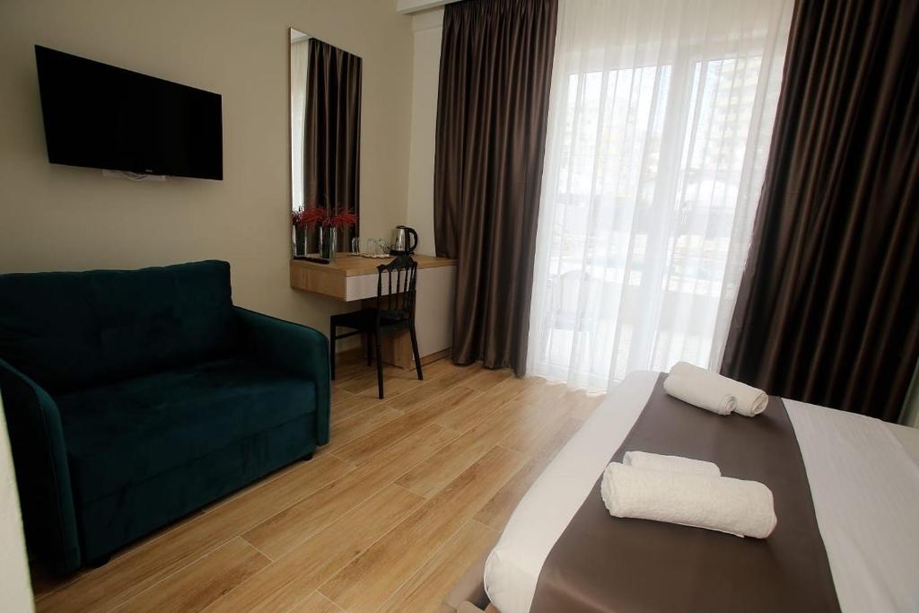 Postel nebo postele na pokoji v ubytování Hotel Villa ATA