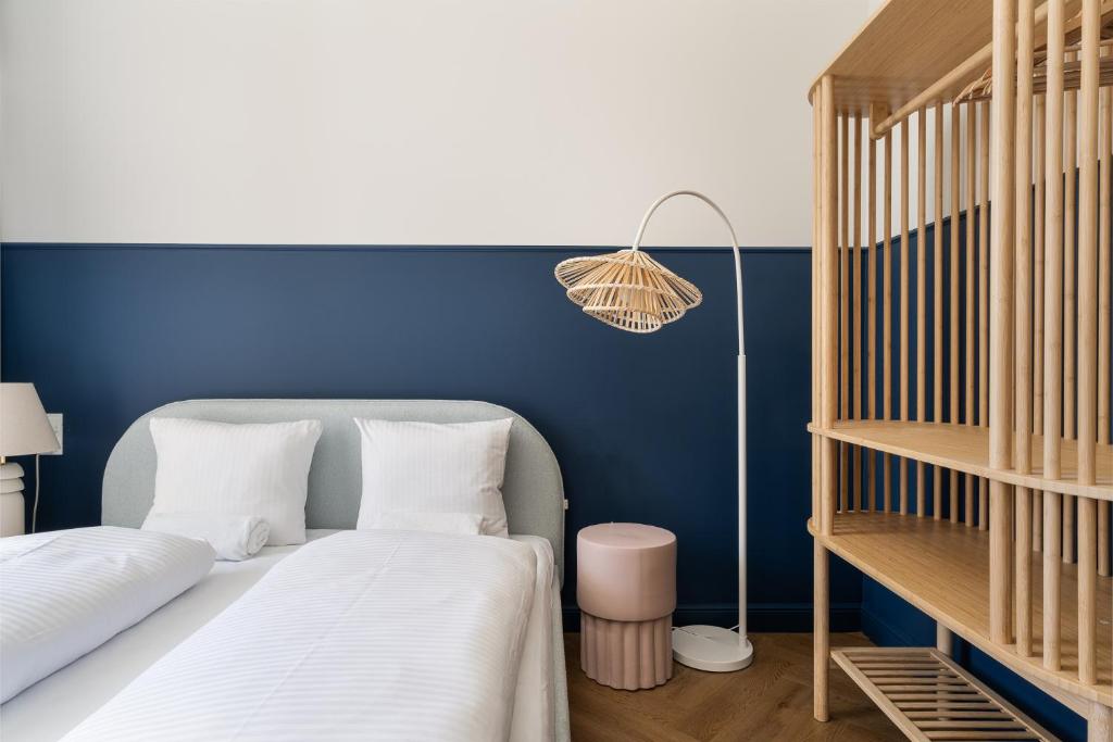 Postel nebo postele na pokoji v ubytování UP'arts