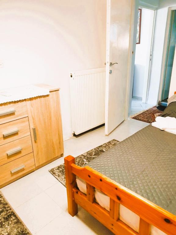 A bed or beds in a room at VILLA ARHONTIKO