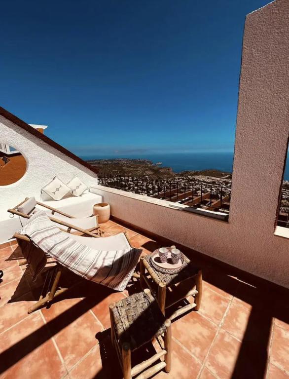 a balcony with a view of the ocean at Spectacular Panorama in Benitachell