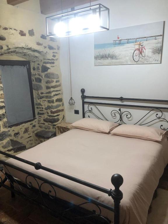 Postel nebo postele na pokoji v ubytování La Torre a colori