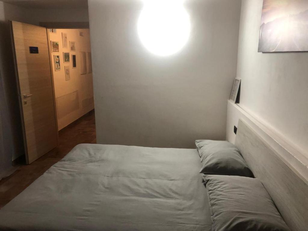 Postel nebo postele na pokoji v ubytování La Torre a colori