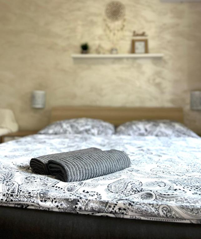 Postel nebo postele na pokoji v ubytování Apartmány ZELENÝ DOM