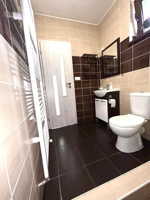 Koupelna v ubytování Apartmány ZELENÝ DOM