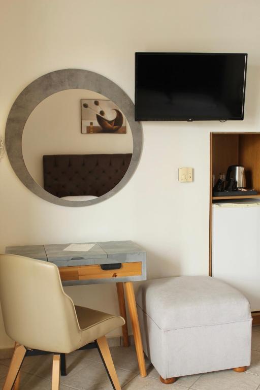 Telewizja i/lub zestaw kina domowego w obiekcie Sofotel
