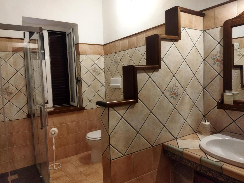 Koupelna v ubytování Villa Manca