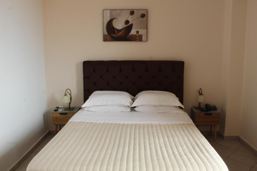 Łóżko lub łóżka w pokoju w obiekcie Sofotel