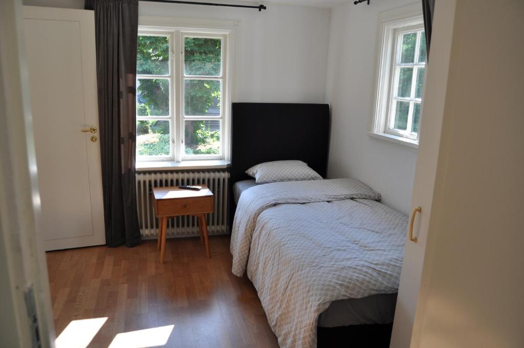 Postel nebo postele na pokoji v ubytování långstorp
