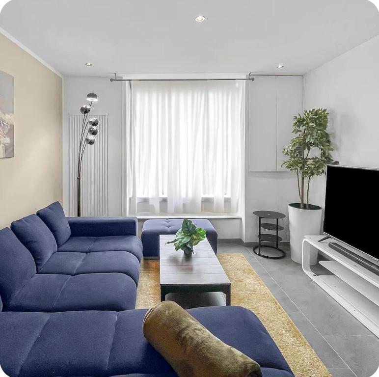 TV a/nebo společenská místnost v ubytování Escapade Authentique
