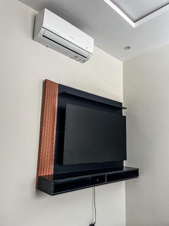 TV a/nebo společenská místnost v ubytování Life House Ubajara