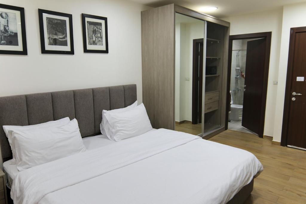 Postel nebo postele na pokoji v ubytování Sindyan Resort