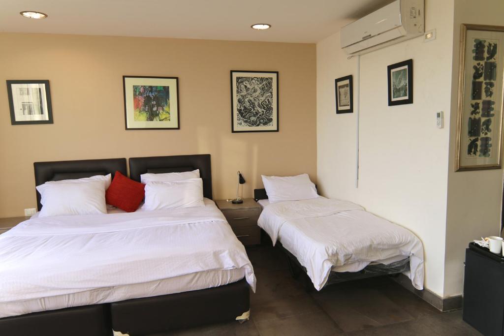Postel nebo postele na pokoji v ubytování Sindyan Resort