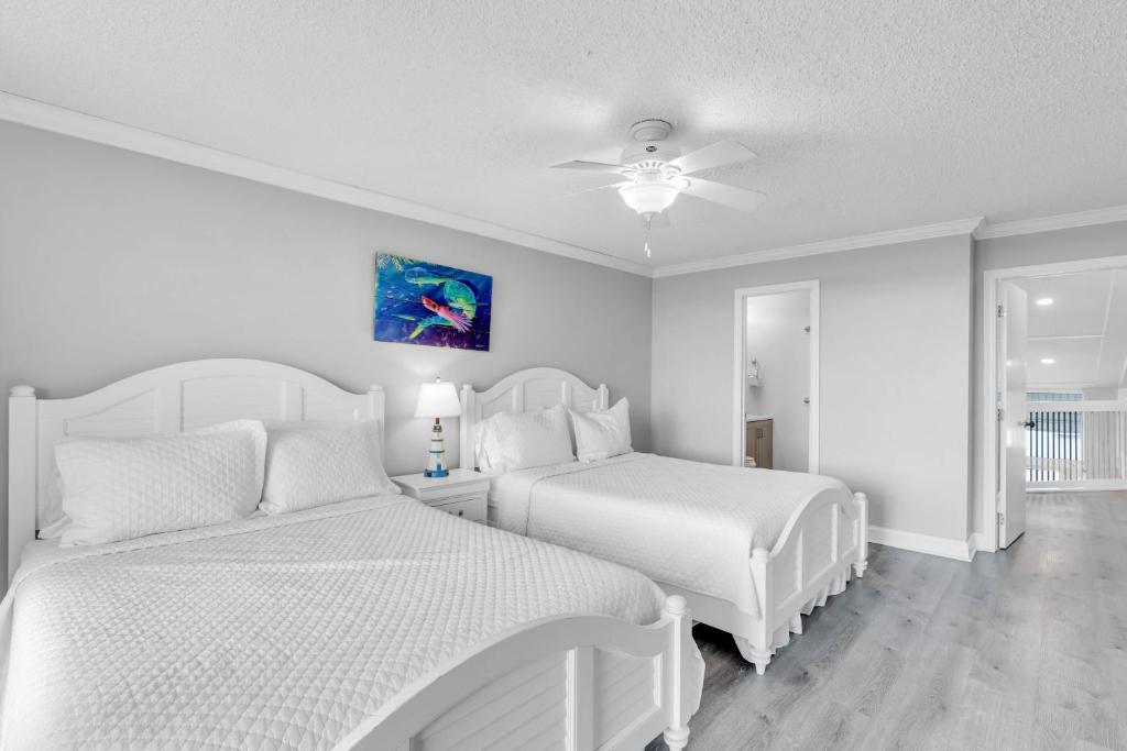 Voodi või voodid majutusasutuse St Croix - Downtown 4x4 Waterfront Penthouse Pool Dock Pet toas