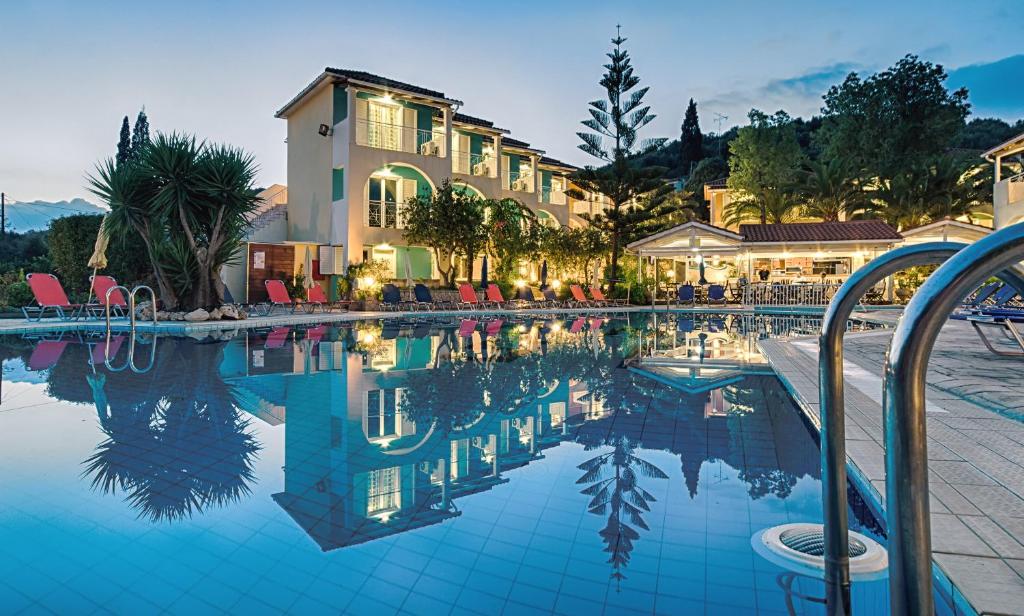 a hotel room with a large pool of water at Sunrise Zante - Adults Only Hotel in Tsilivi
