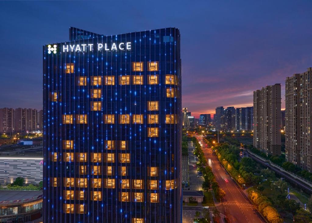 a tall building with the words knight place on it at Hyatt Place Nantong Xinghu City Plaza in Nantong