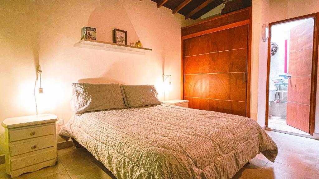 Postel nebo postele na pokoji v ubytování Malaika Hostel Medellín