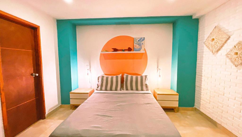 Postel nebo postele na pokoji v ubytování Malaika Hostel Medellín