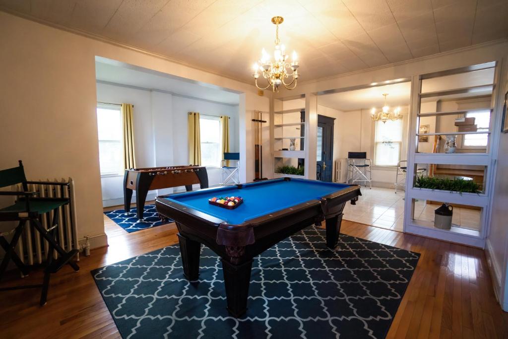 a living room with a pool table in it at Spacious Home In A Quiet Neighborhood in Atlantic City