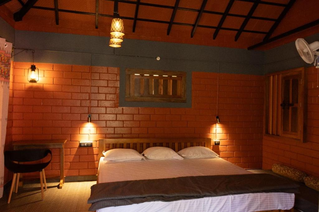 Ένα ή περισσότερα κρεβάτια σε δωμάτιο στο Chombuka