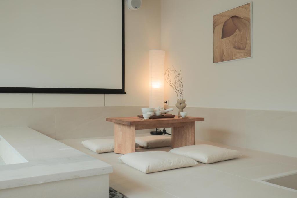 Postel nebo postele na pokoji v ubytování Aank Hotel Wolgot