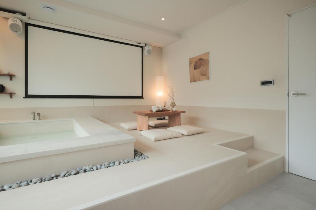 Postel nebo postele na pokoji v ubytování Aank Hotel Wolgot