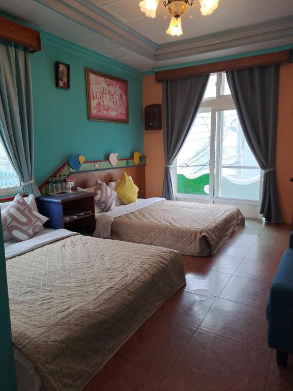 Postel nebo postele na pokoji v ubytování Heart Seed B&B