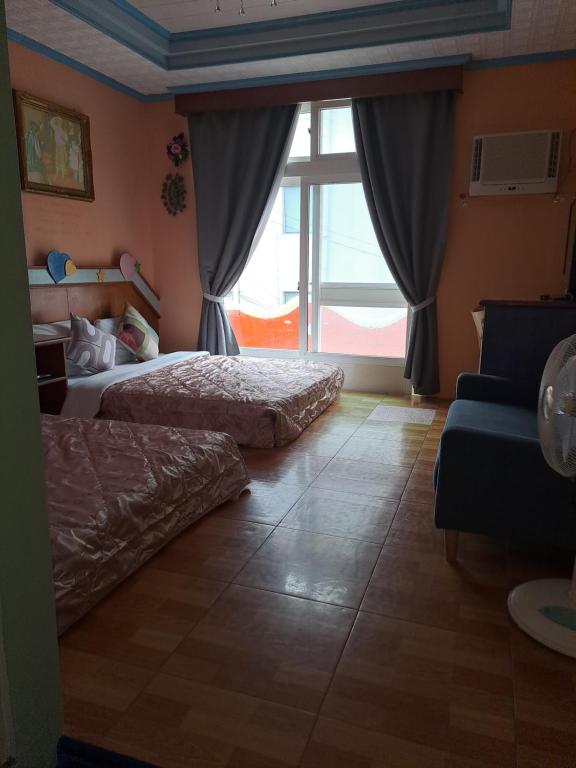 Postel nebo postele na pokoji v ubytování Heart Seed B&B