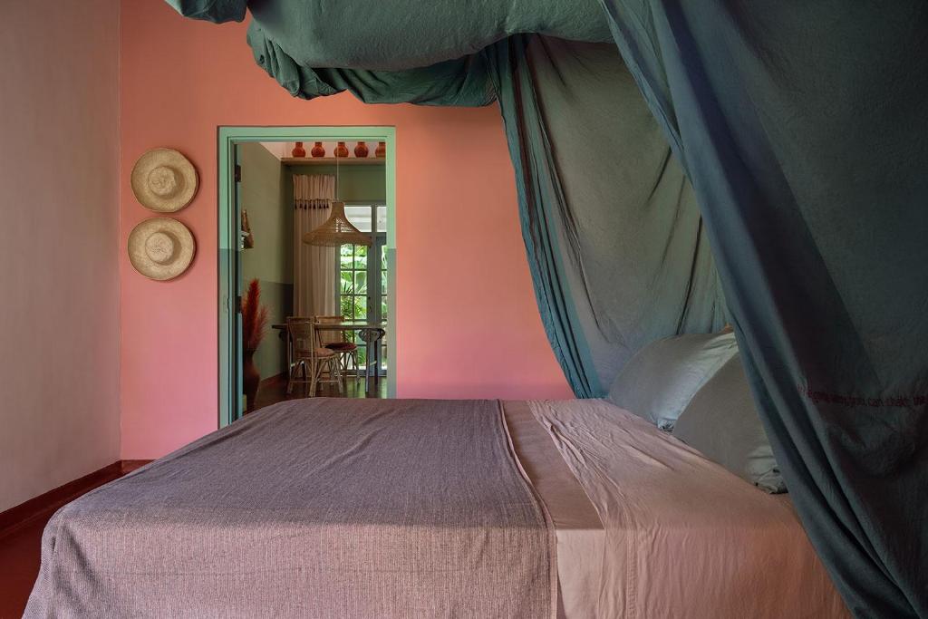 Postel nebo postele na pokoji v ubytování Casa Tikiri - BOUTIQUE HOTEL Adults-Only