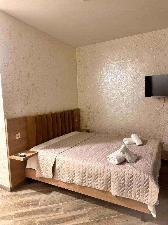 Postel nebo postele na pokoji v ubytování Green Cape Tower