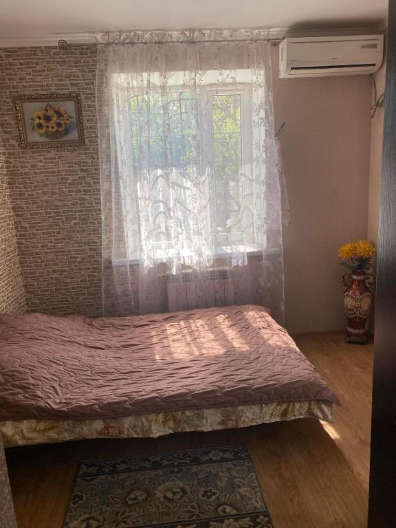 Postel nebo postele na pokoji v ubytování Одесса Море